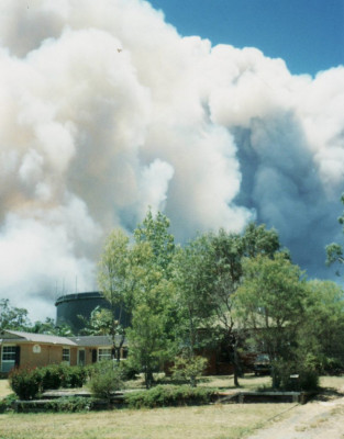 Boxing Day 2001 brought fire close to Mt Riverview on two fronts.